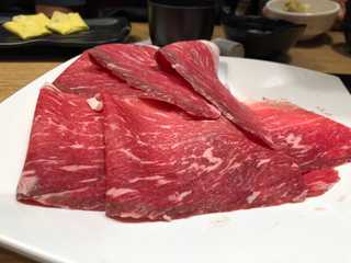 Photograph of a raw meat for shabu-shabu.